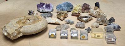 many different types of rocks and stones on the table