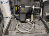 an image of a drill in the back of a truck