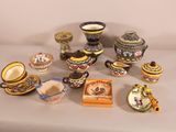 many different types of pottery on the table