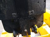 a close up of a fork attachment on a construction vehicle