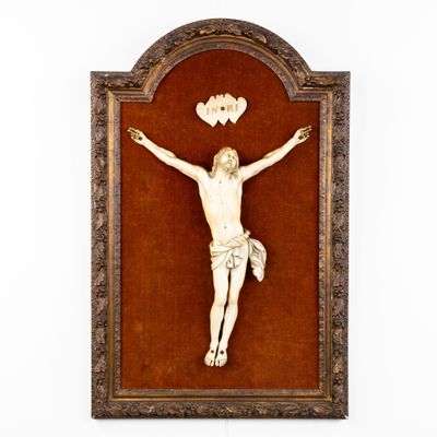 a picture of a crucifix with a heart above it