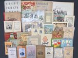 many old books on display on a black table
