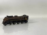 a toy train that is sitting on a white surface