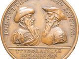 une image représentant une médaille de bronze sur laquelle figurent deux hommes