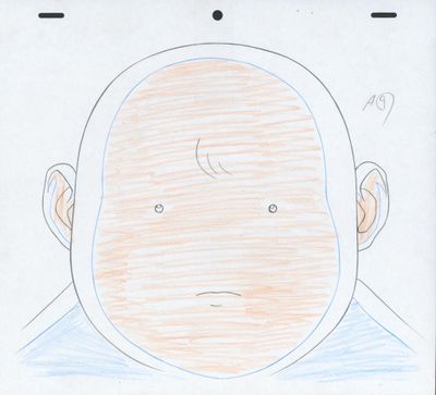 un dessin du visage d'un homme sur une feuille de papier