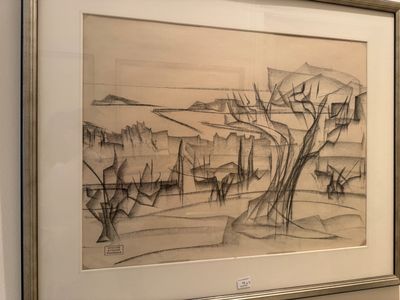 une photo d'un dessin représentant un paysage, dans un cadre