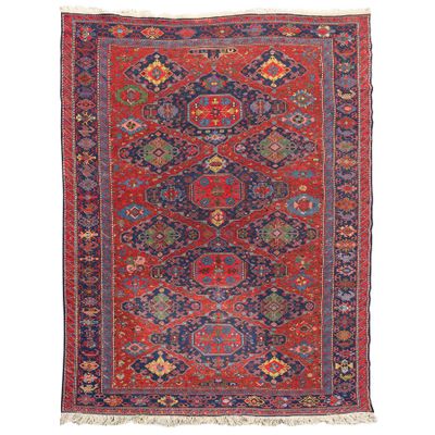 a red and blue rug with a diamond design on a white background