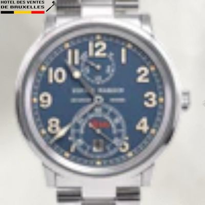 a close up of a wrist watch with a blue dial