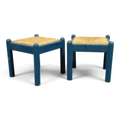 pair of blue painted stools with woven seat cushions