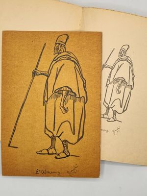 un vieux livre sur lequel figure le dessin d'un homme tenant un bâton