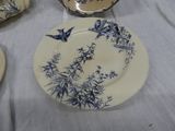 a plate with a blue and white design on it
