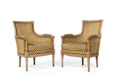 une paire de fauteuils à dossier en rotin de style Louis XVI