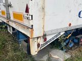 a truck that is parked on the side of the road