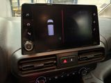 a picture of a car dashboard with a cell phone in it