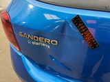 a sticker on the back of a car that says sandero start here