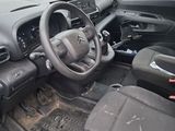 a car that has a steering wheel and a dash board in it