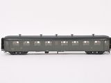 a train car that is sitting on a white surface