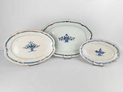 four pieces of blue and white porcelain dishes and plates