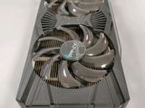 a close up of a video card with a fan on top of it