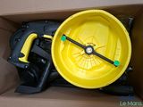 a box with a yellow wheel inside of it