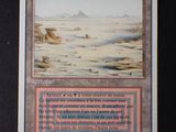 une photo d'une carte illustrée d'un paysage désertique
