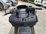 a motorcycle that is parked on the side of the road