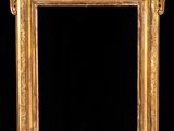 an ornate gold frame with a black background and a black background