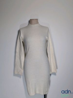 an image of a white sweater dress on a mannequin stand