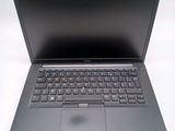 a laptop computer with a keyboard on the top of it