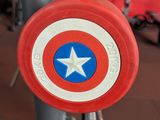 a captain america shield on the back of a bike