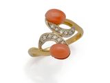an orange coral and diamond ring
