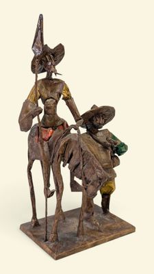 statue représentant une femme à cheval, avec un homme sur le dos