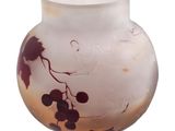 a glass vase with a design on it on a white background