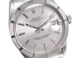 an image of a silver rolex watch with a white dial