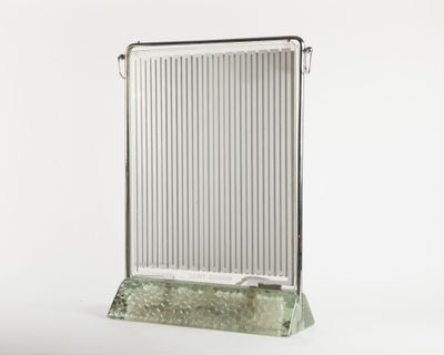 a radiator that is on a stand on a white background