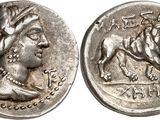 a silver coin with an image of a woman and a horse on it