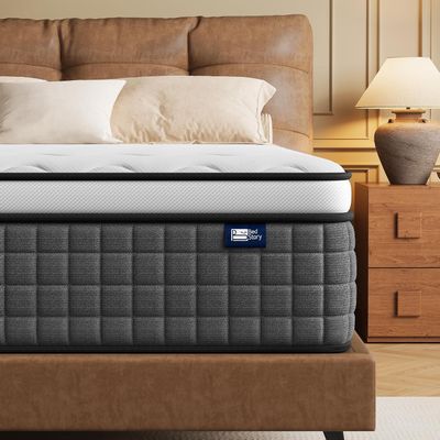 a bed with a mattress and a night stand in the room