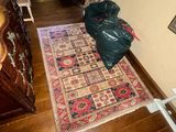 a bag sitting on the floor next to a door
