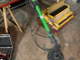 a machine that is sitting on a table in a garage