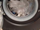a washing machine that is sitting on a pallet