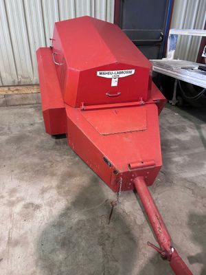 an image of a red machine that is in a garage