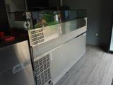 a fish tank in the middle of the room