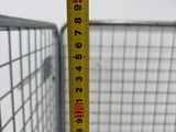 a measuring tape that is on the side of a shopping cart
