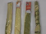 four different types of cheese sticks are on a white surface