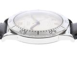 a close up of a wrist watch with a white dial