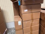boxes stacked on top of each other in front of a building