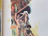 an open book with a picture of a naked woman and a man