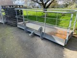 a metal ramp that has been placed on the side of the road