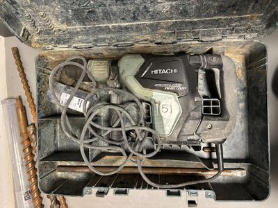 a tool in a case that is sitting on the floor
