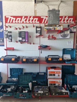 many tools on the wall in the shop